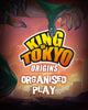 Spelers in actie tijdens King of Tokyo Origins – dobbelstenen, monsters en kaartspel