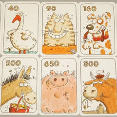 Koehandel kaartspel met dierenkaarten, geldbriefjes en varianten zoals Koehandel Master en Koehandel Junior