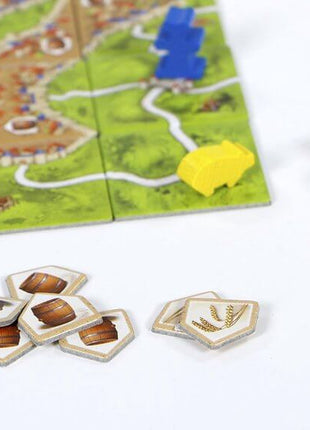 Dit is een foto van het spel Kooplieden & Bouwmeesters - Carcassonne te koop bij Speldorado Spellenwinkel Delft