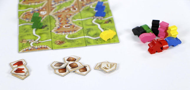Dit is een foto van het spel Kooplieden & Bouwmeesters - Carcassonne te koop bij Speldorado Spellenwinkel Delft