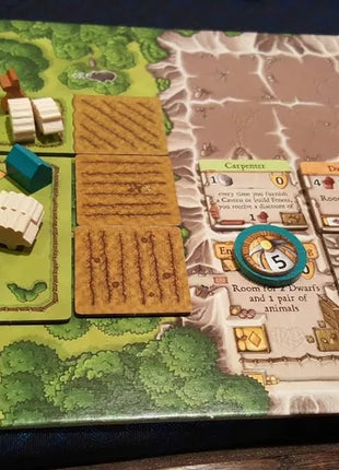 Dit is een foto van het spel Caverna EN te koop bij Speldorado Spellenwinkel Delft