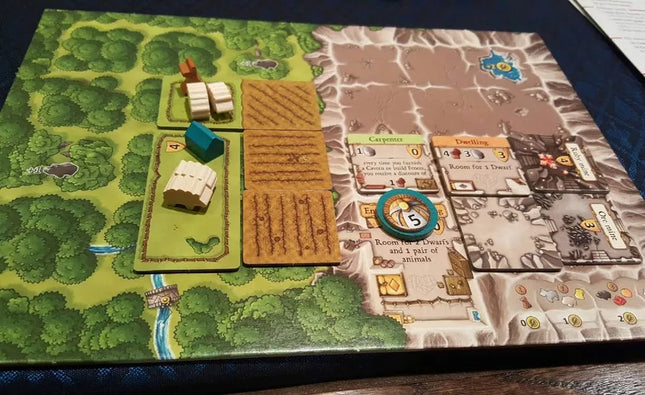 Dit is een foto van het spel Caverna EN te koop bij Speldorado Spellenwinkel Delft