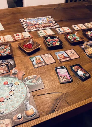 Dit is een foto van het spel De Kwakzalvers Van Kakelenburg De Alchemisten te koop bij Speldorado Spellenwinkel Delft