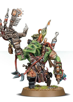 Dit is een afbeelding van het miniatuur Painboy - Orks voor het spel Warhammer, te koop bij Tabletop Miniature Wargames spellenwinkel Speldorado in delft