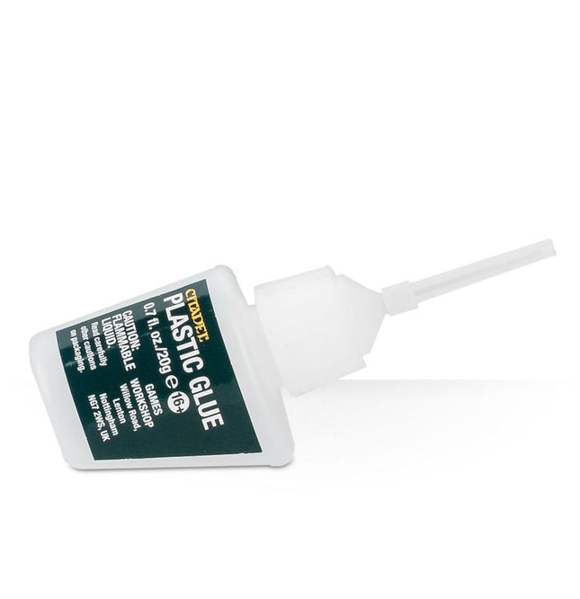Dit is een foto van het spel Plastic Glue  - paints + Tools te koop bij Speldorado Spellenwinkel Delft