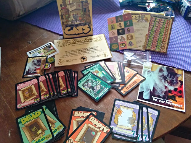 Dit is een foto van het spel Schrodingers katten te koop bij Speldorado Spellenwinkel Delft