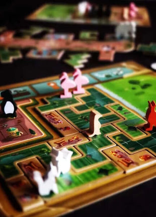 Afbeelding van het bordspel New York Zoo, te koop bij Speldorado. Het spel heeft een dierentuinthema met kleurrijke dierenfiguren en speeltegels.